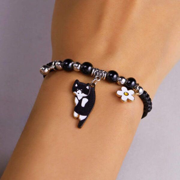 Braccialetto regolabile in tessuto gattino nero e charms
